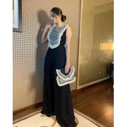 Gorgeous party wear jump suit in black and yellow colors